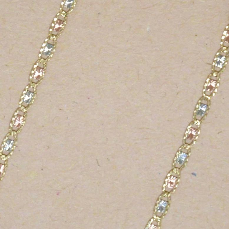 14k yellow, white, and rose gold oval link chain featuring a polished finish and interlocking tri-color gold links with a secure lobster clasp.