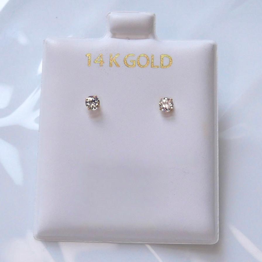 14k solid gold small stud earrings featuring high-quality cubic zirconia stones in a classic 4-prong setting, ideal for everyday elegance.